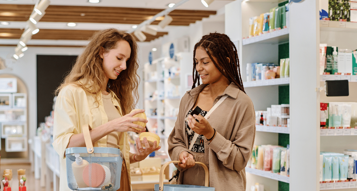 Two women shopping in a cosmetics store